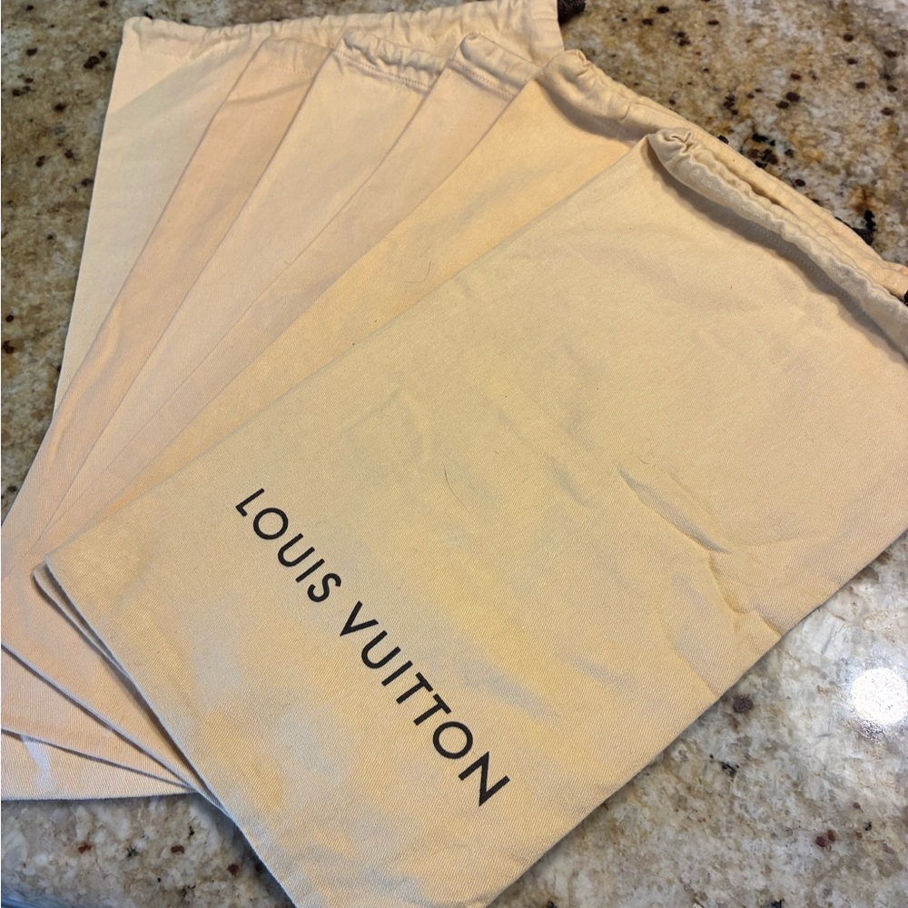 Louis Vuitton Cream Dust Bags with Black Logo: 4 are 9x15” and 1 is 17.5x 10.5